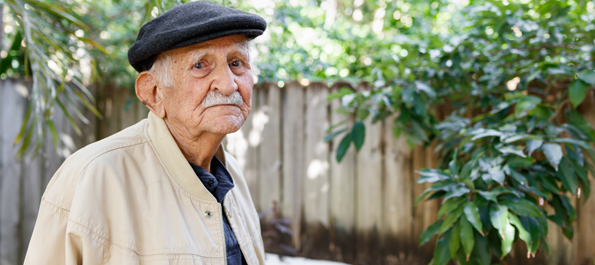 Jose, an old man standing outside