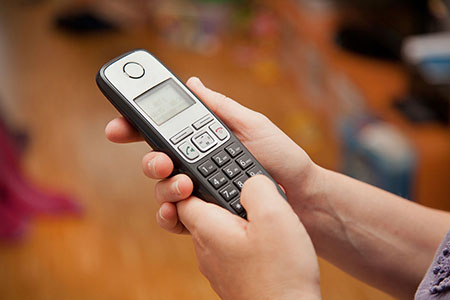 hands holding a phone