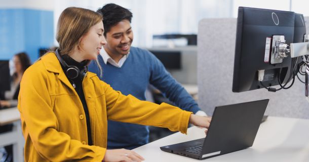 TIO team members working in the office