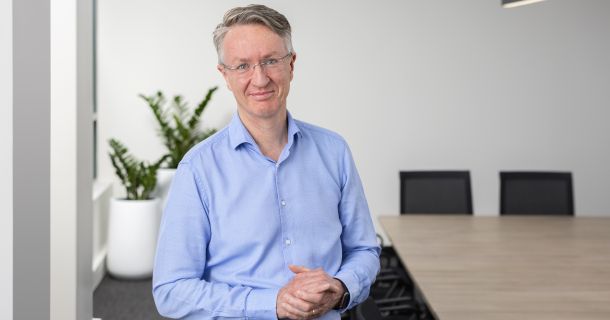 Photo of Glen Noonan in an office