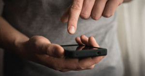 Digital platform user accessing technology by mobile phone